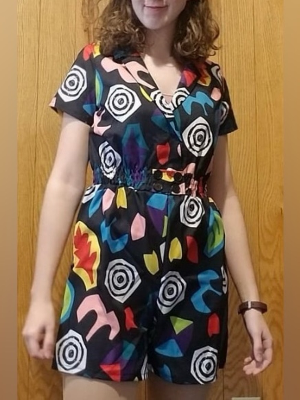 Netflix branded Eleven Black Multicolor Abstract Print romper